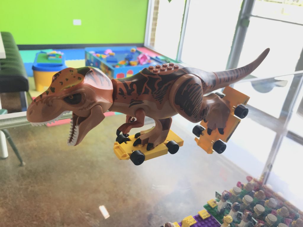Lego T-Rex on rollerskates.