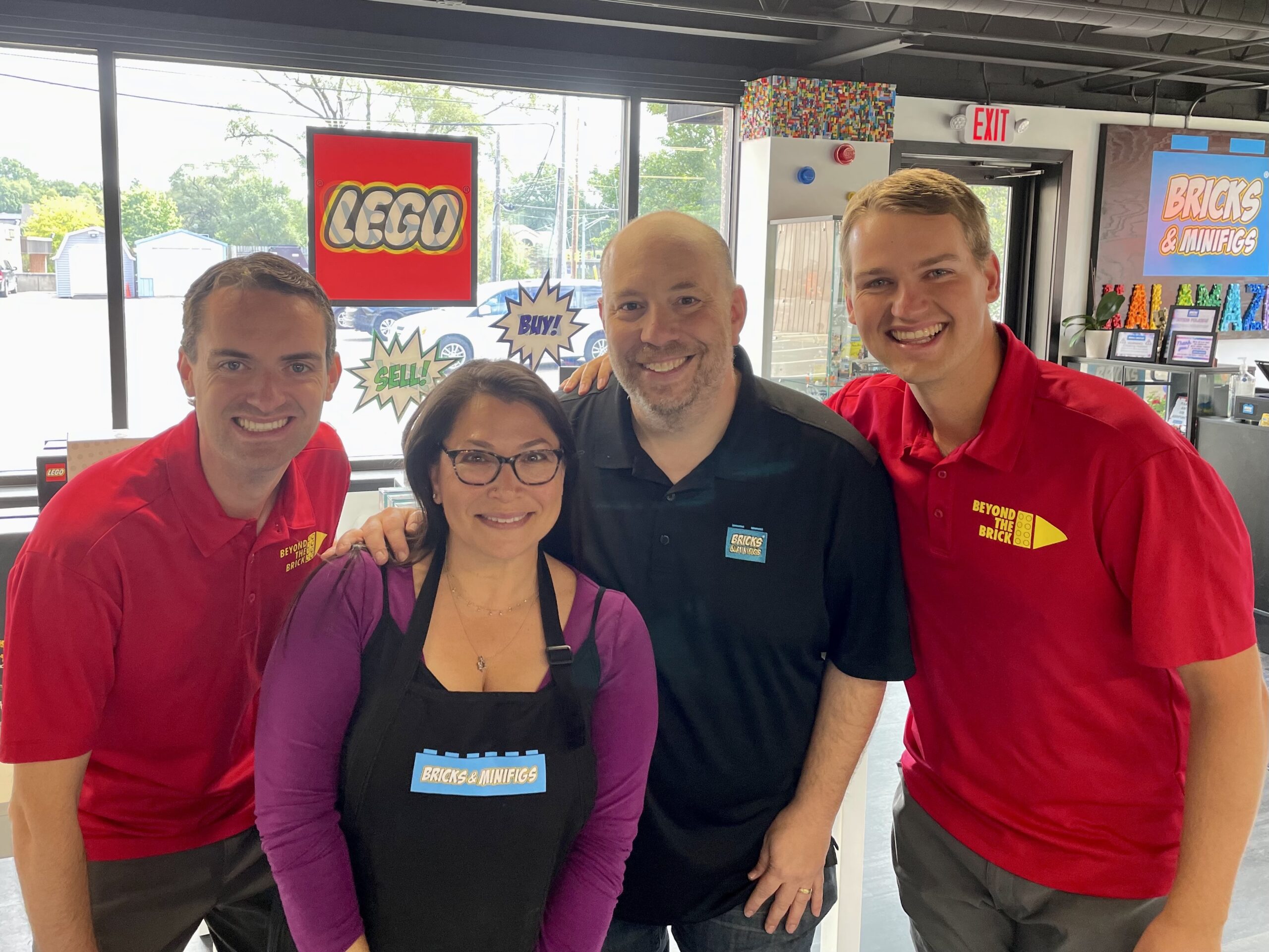 Image of Bricks & Minifigs Kalamazoo owners with Beyond the Brick hosts