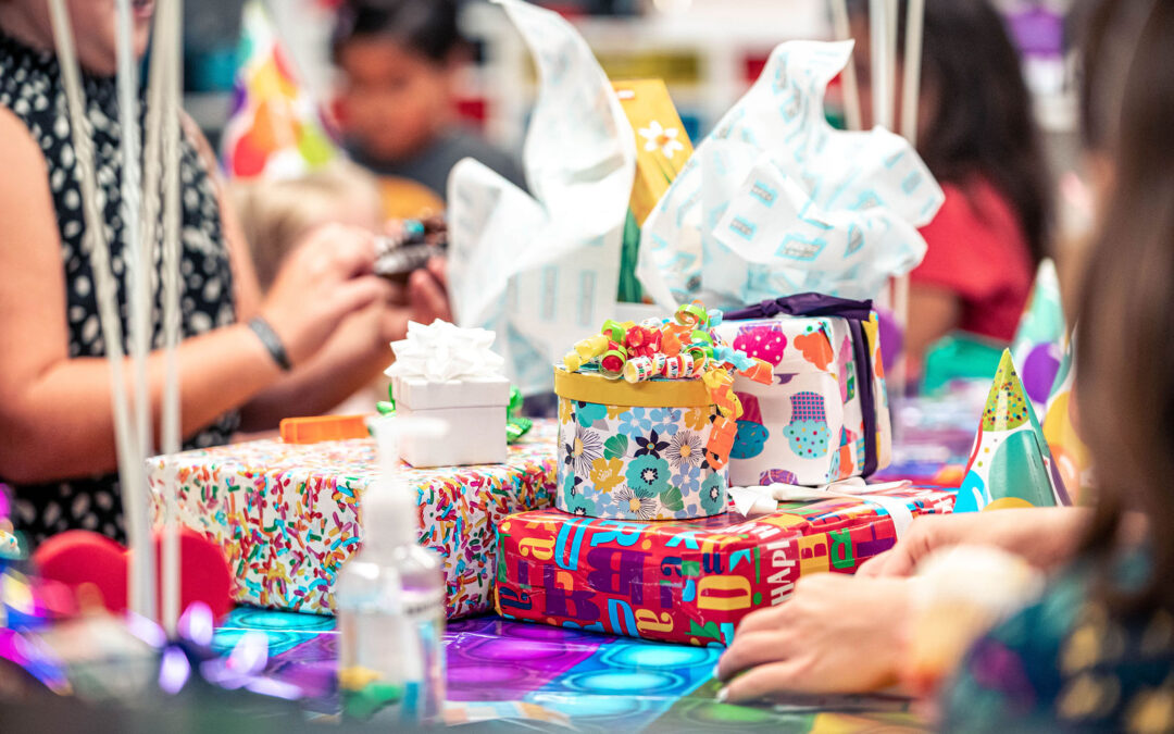 Children play with LEGO at a birthday party hosted at Bricks and Minifigs Kalamazoo.