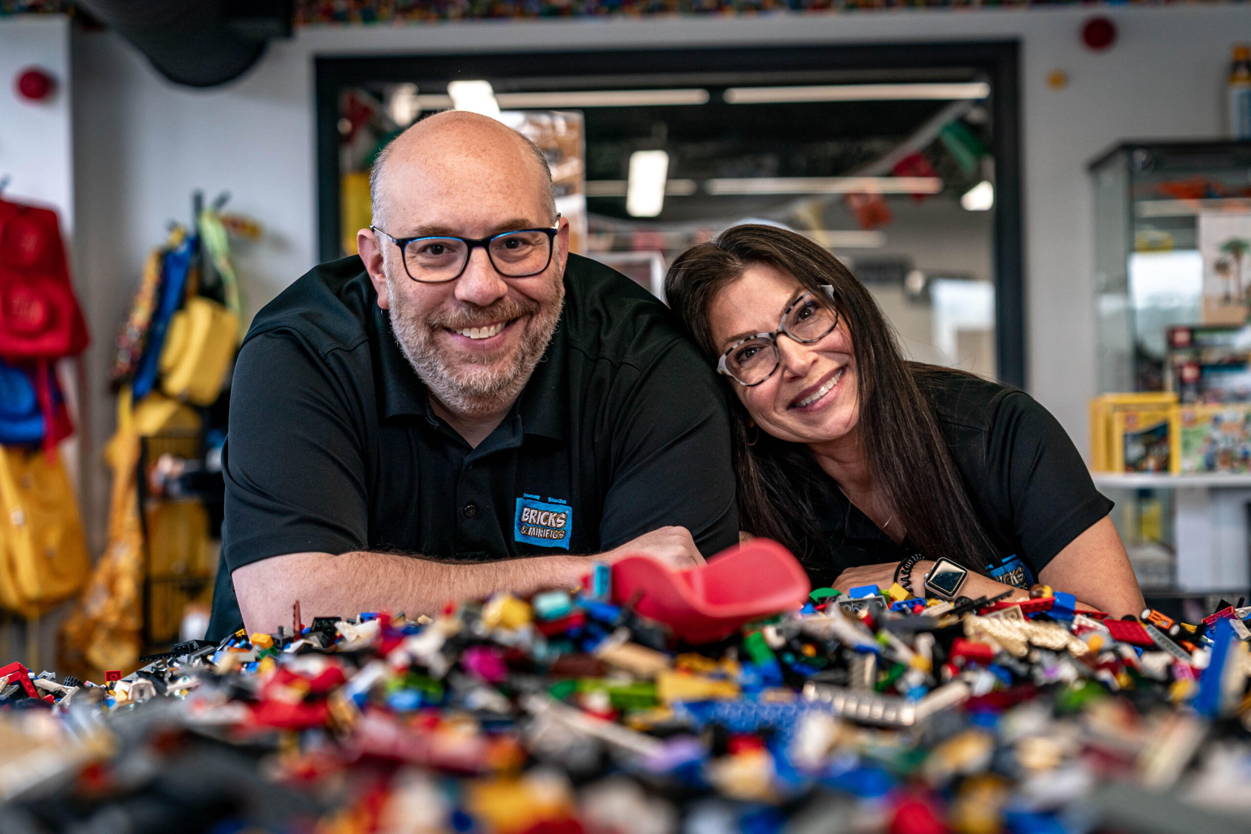 Image of Bricks & Minifigs Kalamazoo owners with Beyond the Brick hosts
