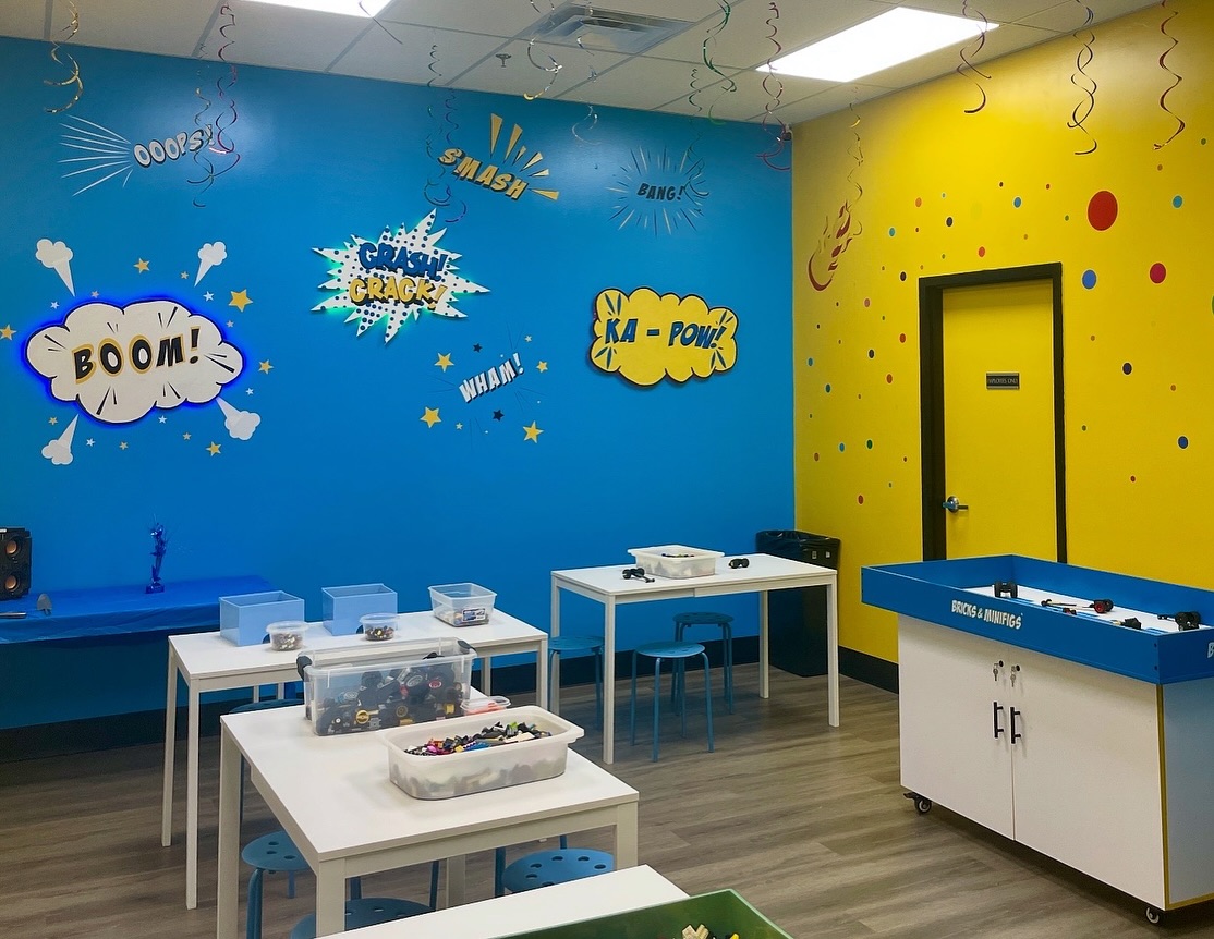 figures arranged as if celebrating a birthday party