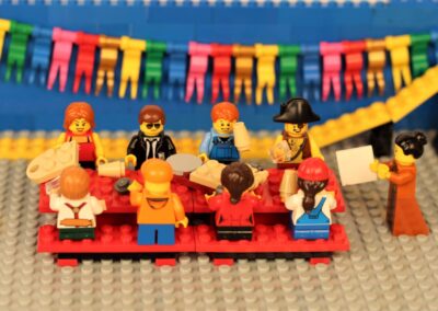scene of birthday party built using Lego® minifigures and bricks
