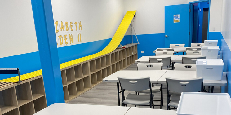 party room showing tables, cubbies, room for playing with LEGO®