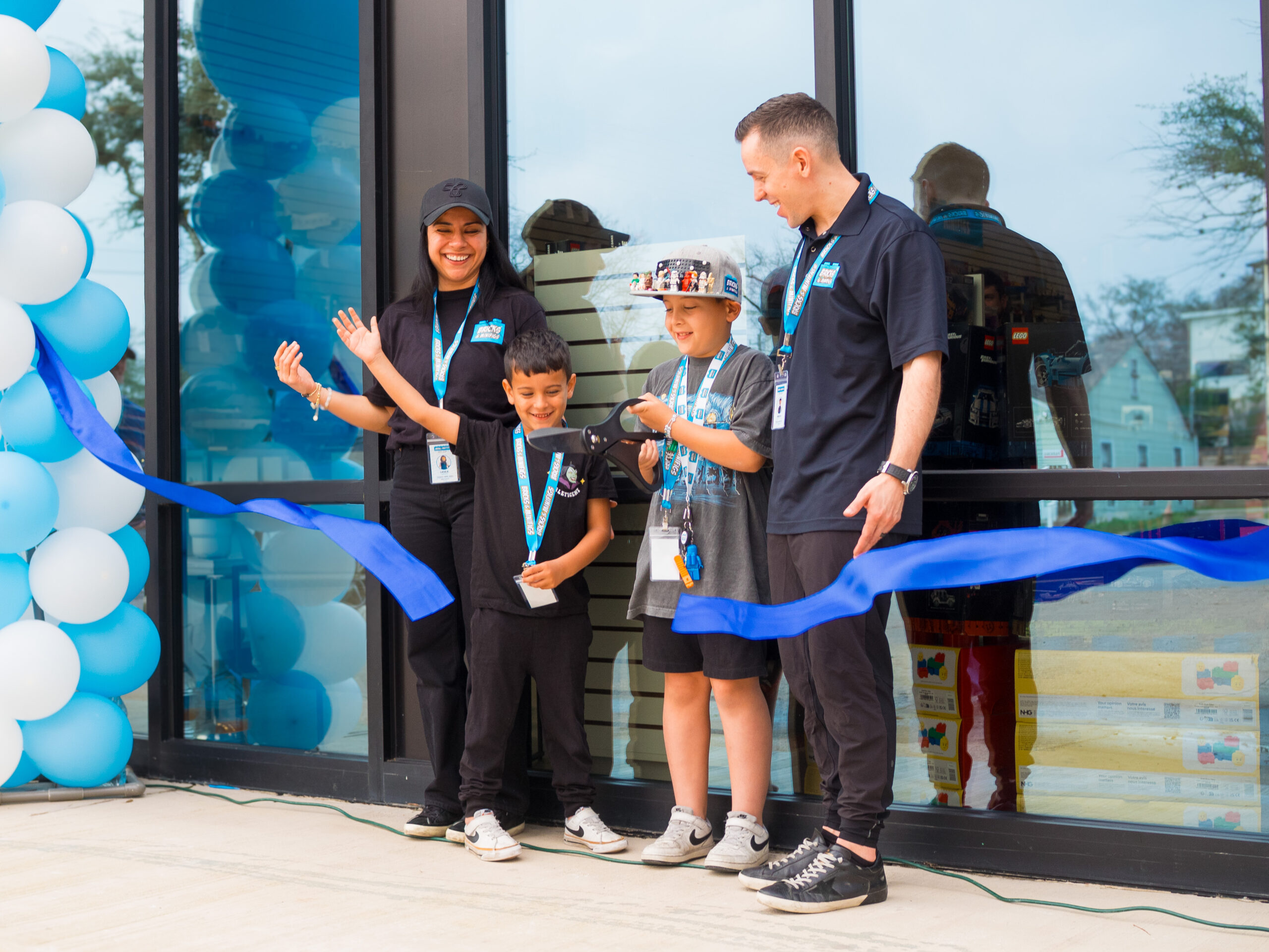 close up several people holding mini figurines