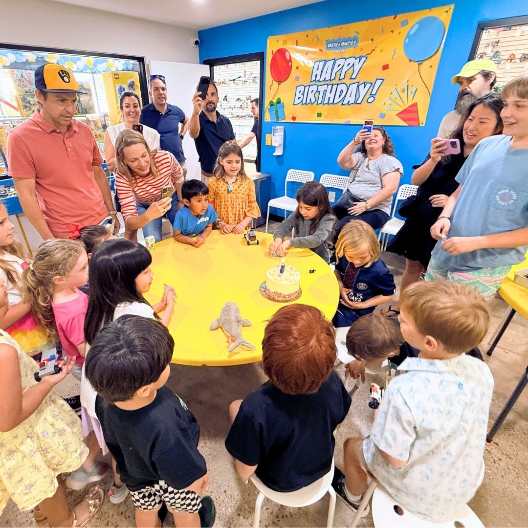 birthday party room with toys and party decorations