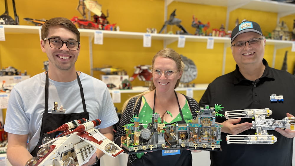 store - feature employees holding LEGO® creations at the San Diego BAM store
