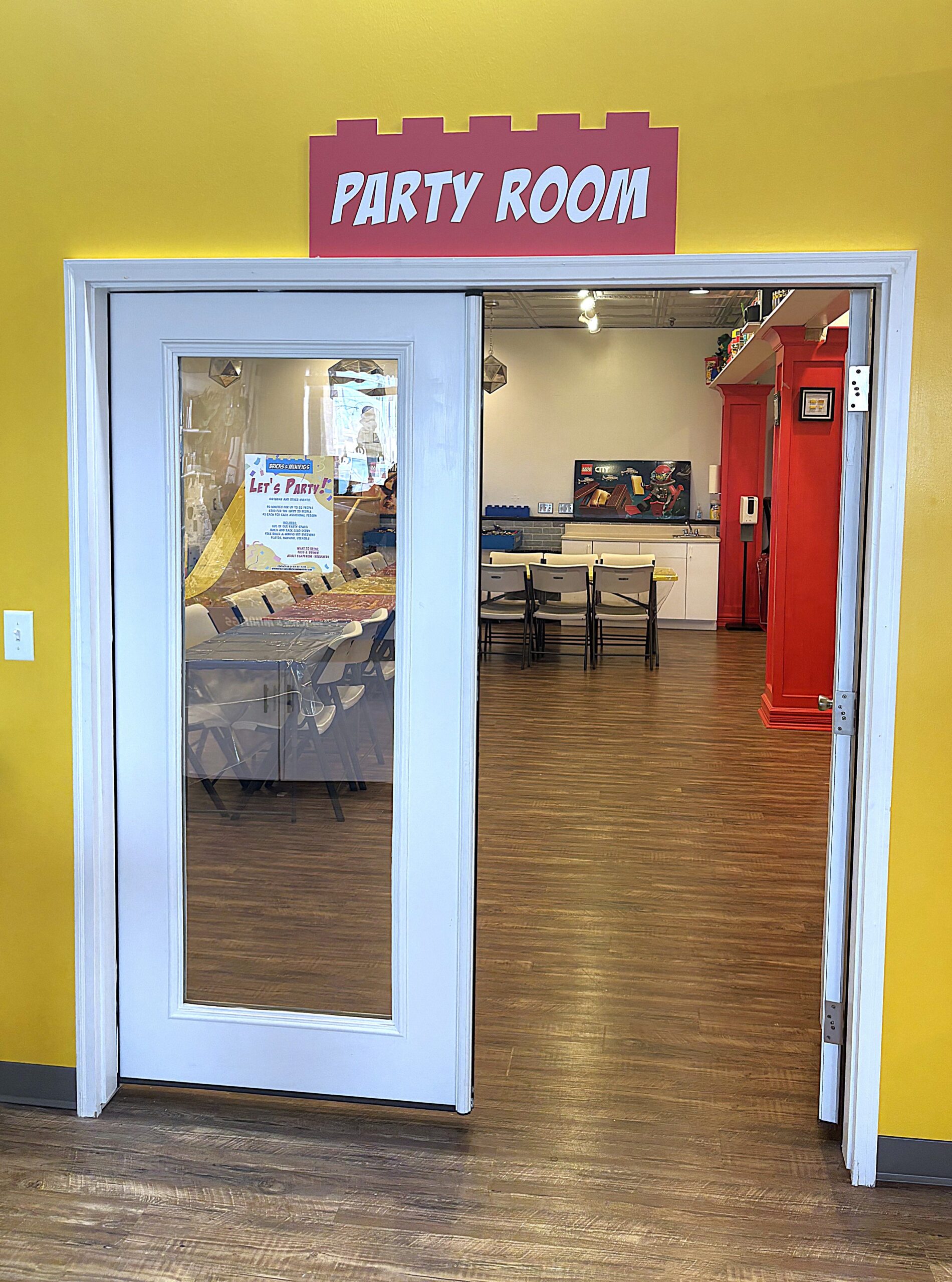 figures arranged as if celebrating a birthday party