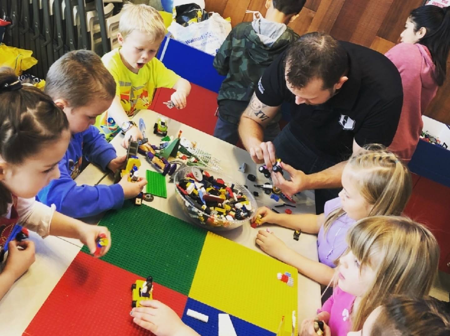 Photo-op of child Lego creators.