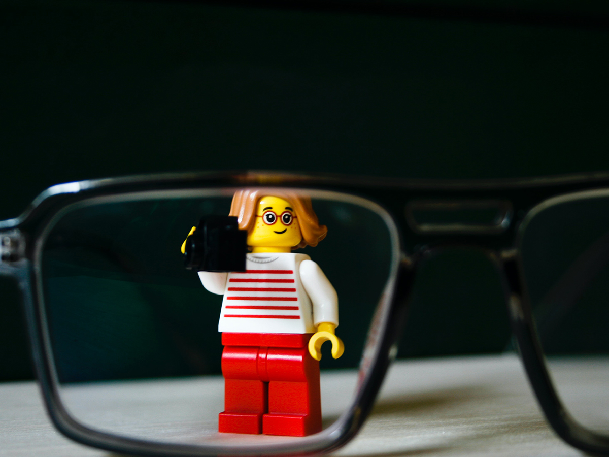 lego person behind a pair of glasses