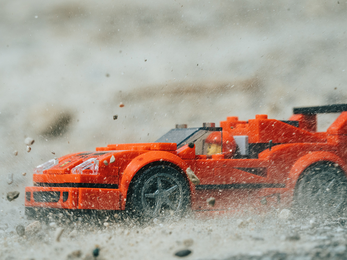 Lego Ferrari with minifig drifing