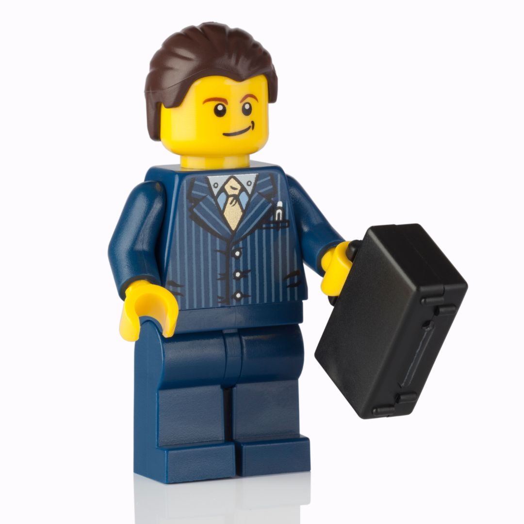 A Lego business person holding a brief case