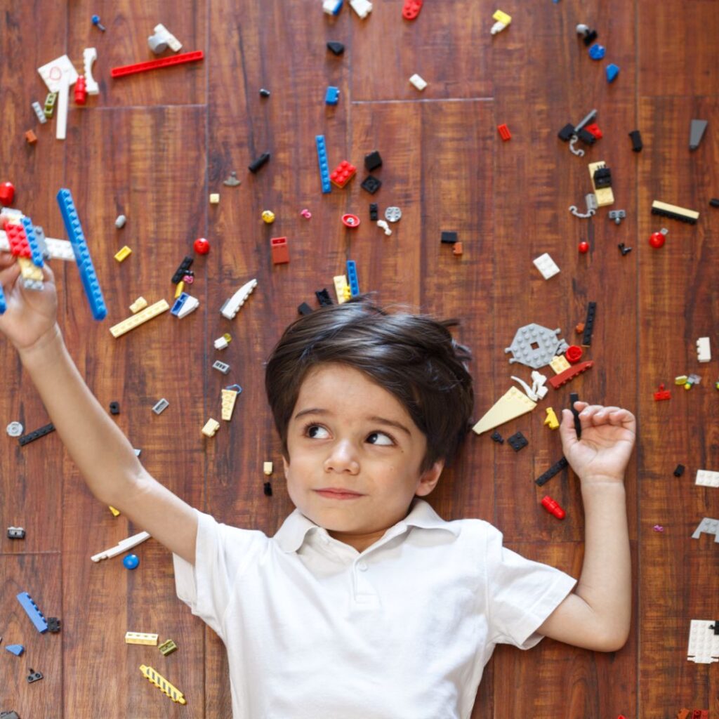 child with legos