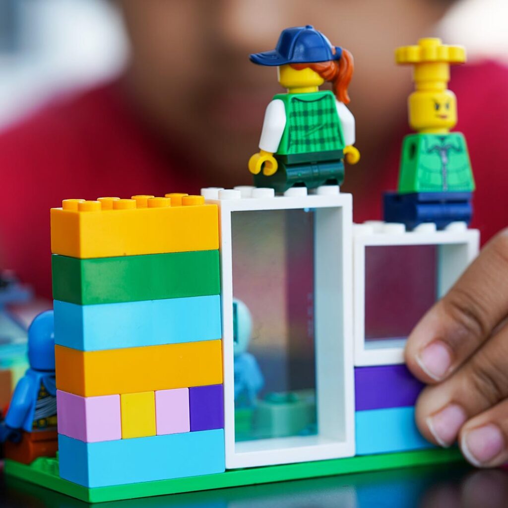 child playing with legos