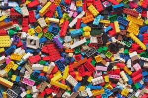 a pile of assorted LEGO pieces in a variety of colors