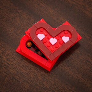 A heart-shaped box of chocolates made with LEGO® bricks